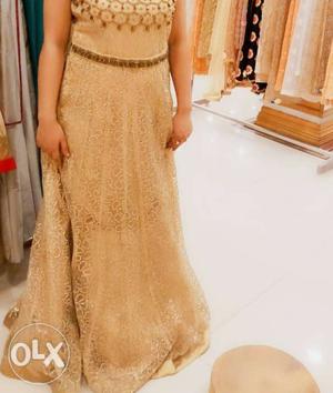 This is very beautiful golden party wear dress