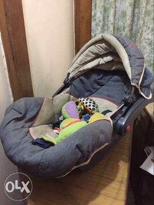 Baby's Gray And Black Car Seat Carrier