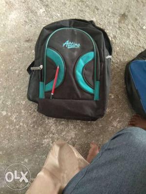 Black And Teal Attire Backpack