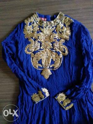Blue Anarkali Suit with Golden Embroidery.