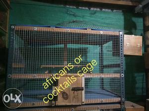 Blue, Brown, And Gray Metal Pet Cage