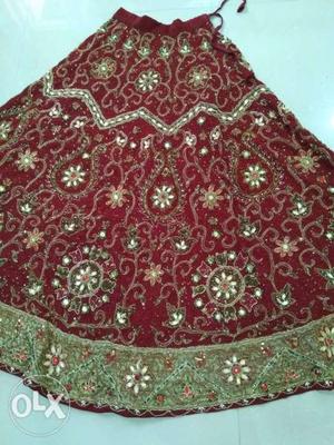 Heavy embroidered bridal maroon lehenga. used once only.