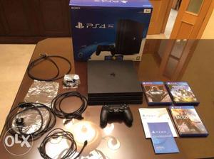 My brand new ps4 with 12 cd games for sell