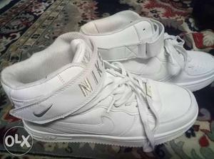 Pair Of White Nike Air Force 1 High Sneakers
