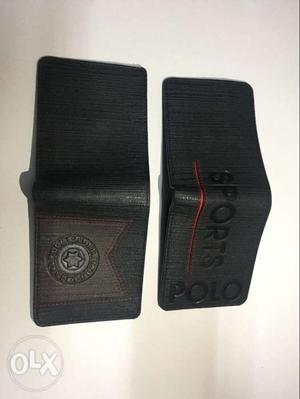 Two Black Leather Bi-fold Wallets