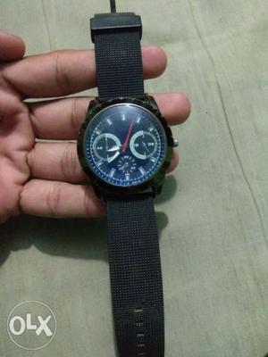 Watch with royal blue Diel and black belt