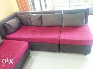 10months old L-shaped sofa set with cushions in