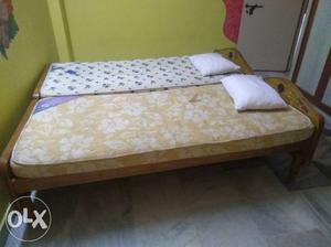 2 single cot beds with mattress