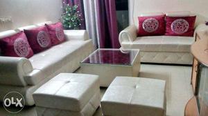 5 seater white sofa with center table