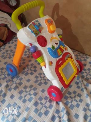Baby's White And Multicolored Plastic Push Walker