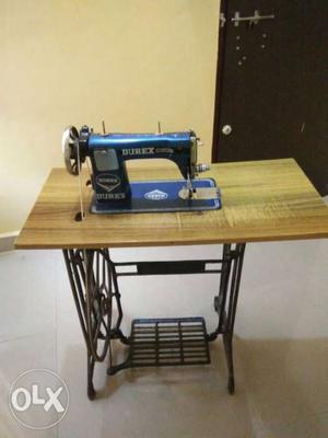 Blue And Brown Treadle Sewing Machine