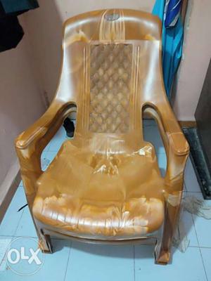 Brown And Beige Wooden Rocking Chair