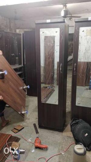 Brown Single Door Cupboard With Mirror Case On Delivery