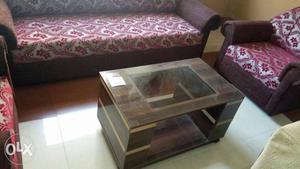 Brown Wooden Framed centre table.