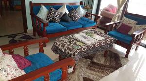 Complete wooden sofa (3+2) with cushions in an