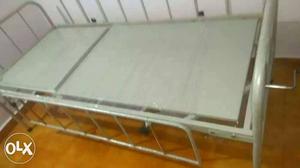 Gray And White Metal Bed Frame