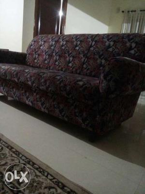 It is a 3+1+1 Sofa with floral patterns. The sofa