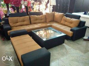 L shape sofa with cauch and table