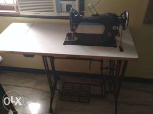 Merit Black Sewing Machine with extended table and reverse