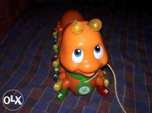Orange And Red Leap Frog Plastic Toy
