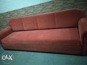 Orange sofa for 5 people. Very comfortable, no
