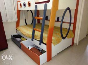 White, Orange, And Yellow Wooden Bunk Bed