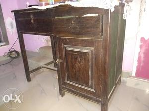 Wooden table with two drawyers and shelf