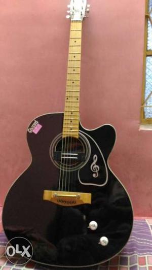Black And Brown Jumbo Cutaway Acoustic Guitar