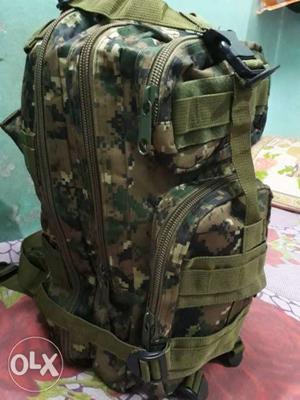 Black And Green Camouflage Backpack