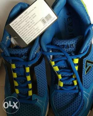 Blue-and-yellow branded Running Shoes