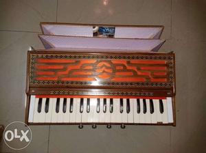 Brown And White Tabletop Accordion