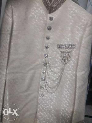 Ethinic sherwani. Off white colour with embroidery