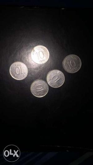 Five Silver-colored 10 Coins