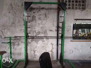 Green And Black Metal Exercise Equipment