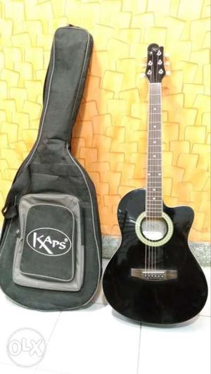 Kaps acoustic guitar with bag and picks just