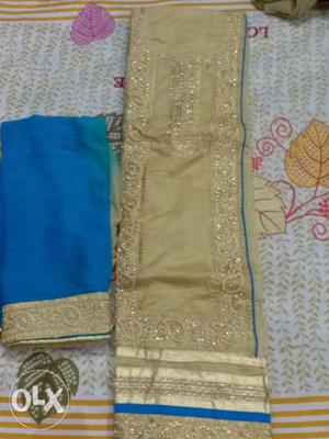 Khadi cotton sute with blue slik bottom and.