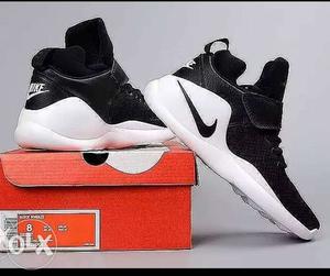 Pair Of Black-and-white Nike Basketball Shoes With Box