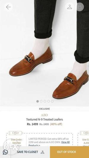 Pair Of Brown Leather Loafers With Text Overlay