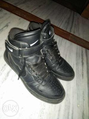 Pair of black high ankle shoes. in brand new