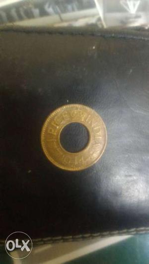 Round Gold-colored Pice Coin