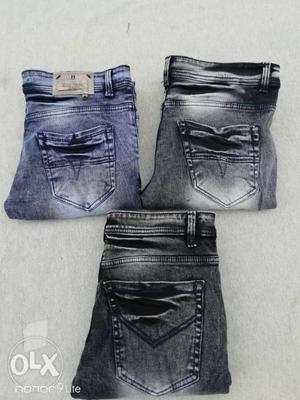 Three Pairs Of Blue Denim Jeans