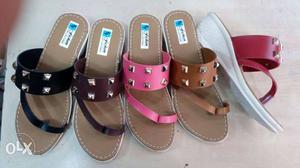 Two Pairs Of Brown And Red Sandals