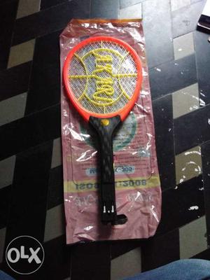 Yellow, Pink, And Black Flies Swatter