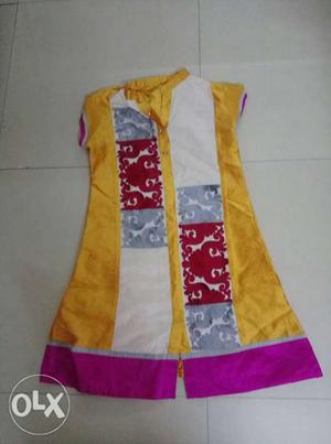 A colurful embroidery on silk kurti