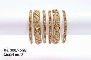 Gold-colored And Clear Gemstones Bangles