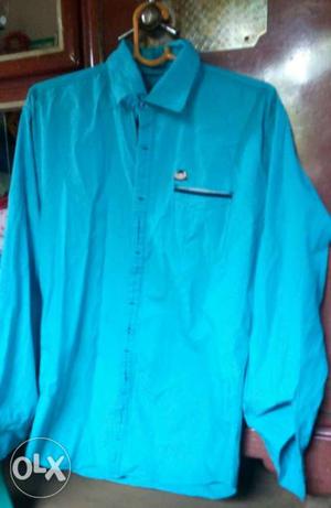 Only 2 time used pure cotton sky colour shirt..