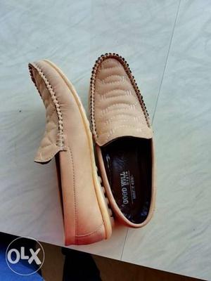 Pair Of Beige Loafers