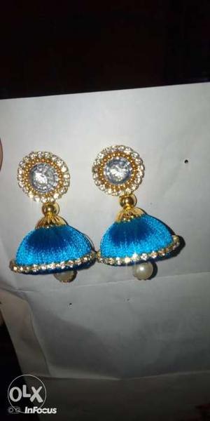 Pair Of Gold-colored And Blue Jhumka Earrings