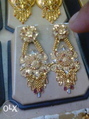 Pair Of Gold-colored Flower Pendant Earrings