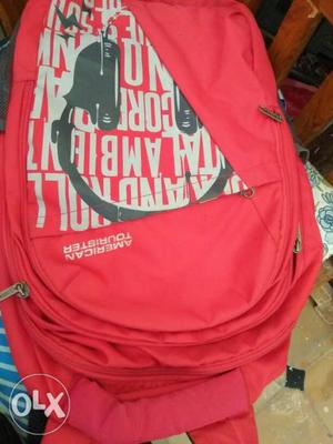Red And White American Tourister Backpack
